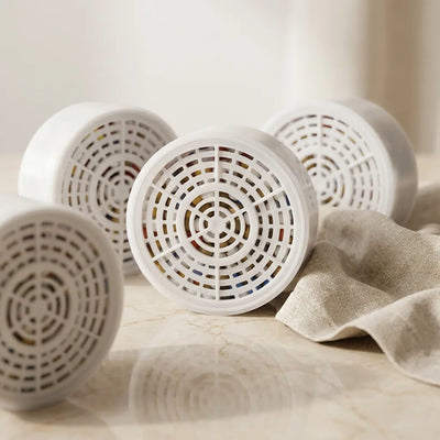 4 replacement cartridges for the AquaPure product standing up front  view